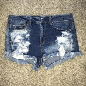 Medium Wash Ripped Hi-Rise Shortie Shorts